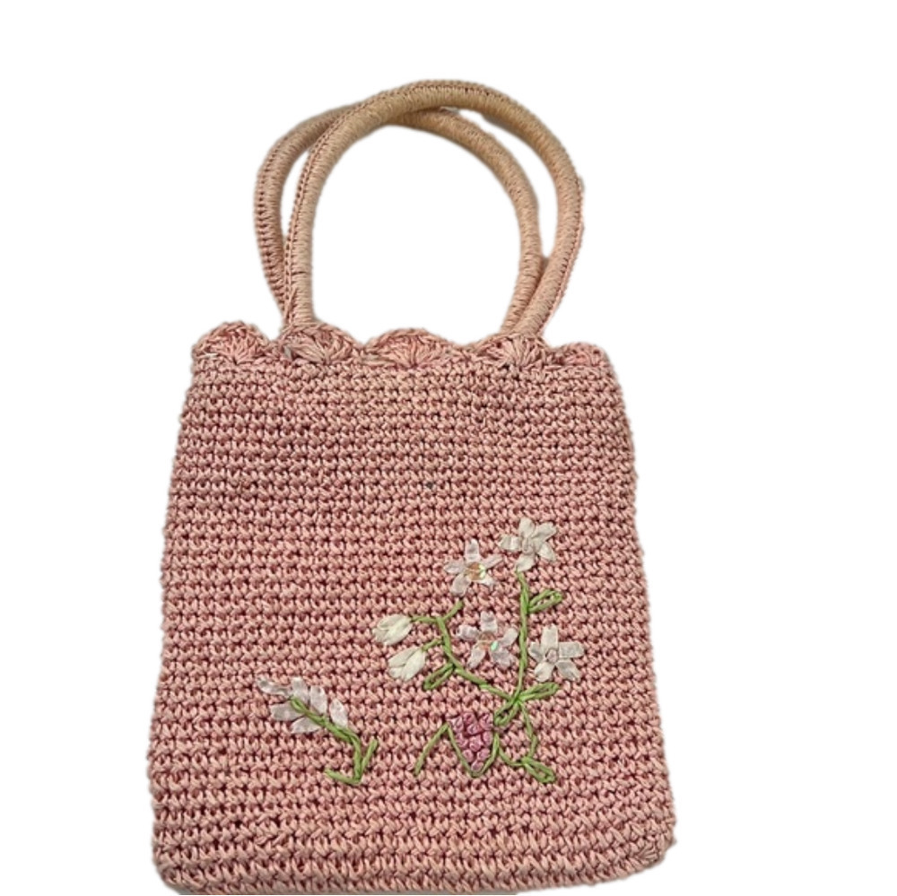 Super cute pink embroidered crochet handbag